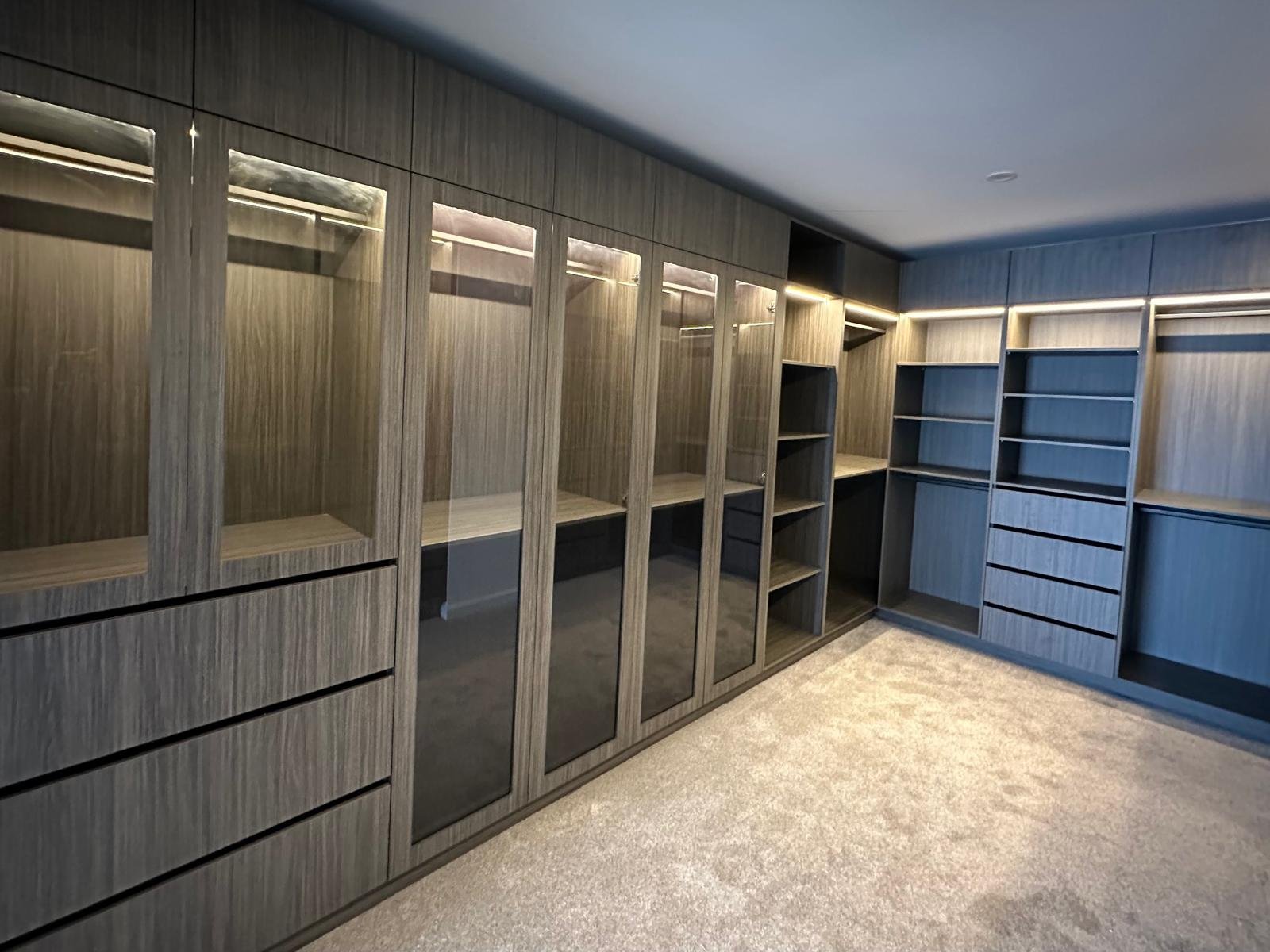Custom walk-in robe with integrated LED strip lighting installed by Cityline Electrical Melbourne